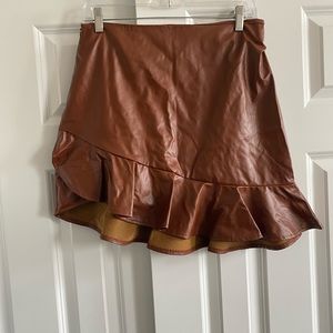 Leather asymmetrical mini skirt